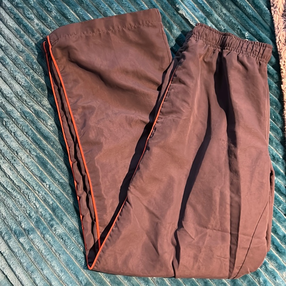 Workout paints small  4-6 gray with orange piping.